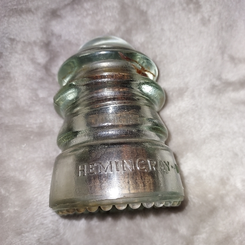 Hemingray -12 glass insulator clear with wood attached inside